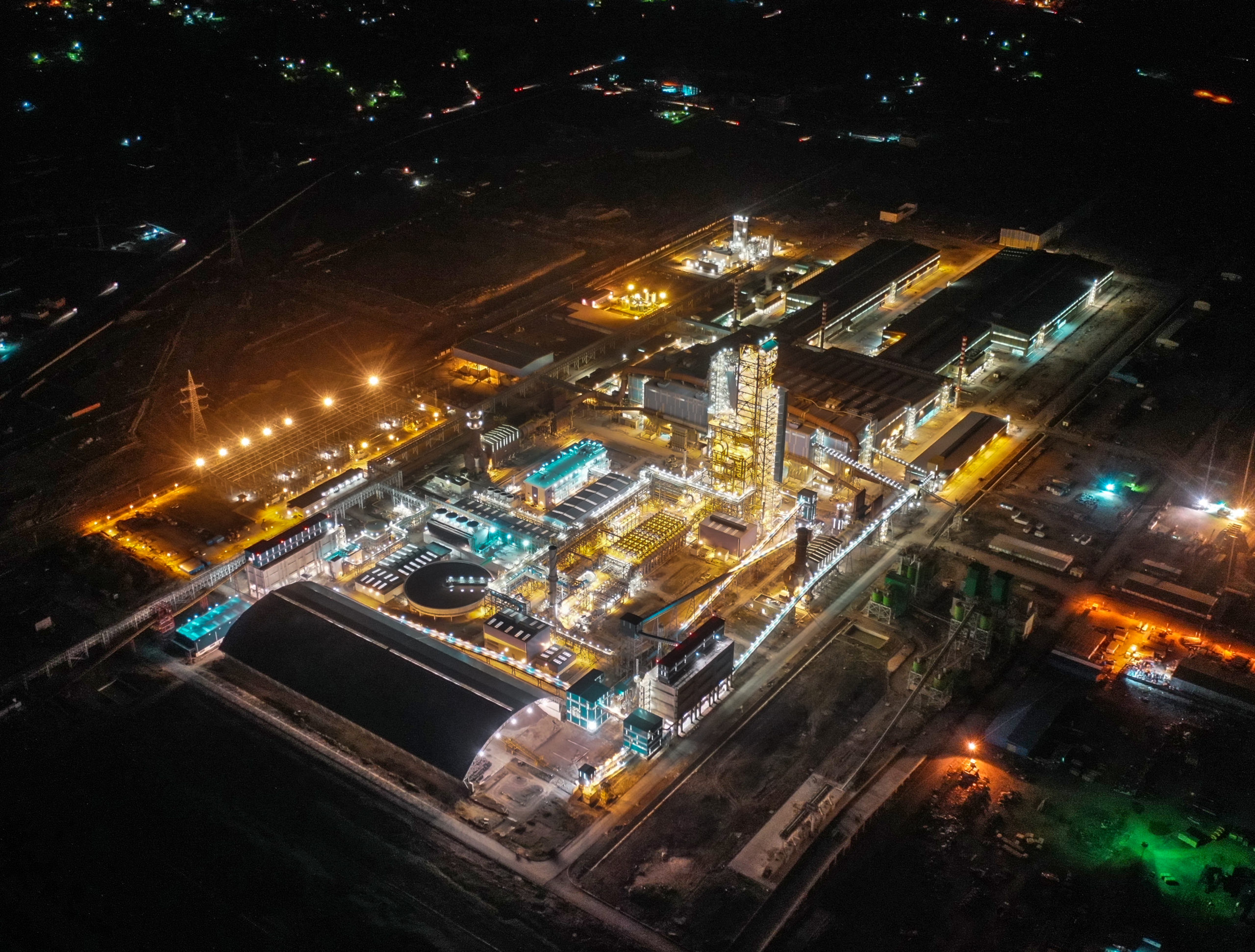 aerial view exterior of plant light up at night