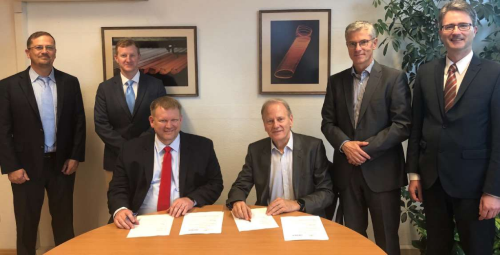 At the signing ceremony in Hamburg: Vincent Chevrier, Todd Astoria and KC Woody from Midrex with Dominique Vacher, Dr Uwe Braun and Matthias Schad from ArcelorMittal (from left to right) 